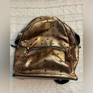 MCM large chrome gold backpack with authentic card and dust bag, EUC